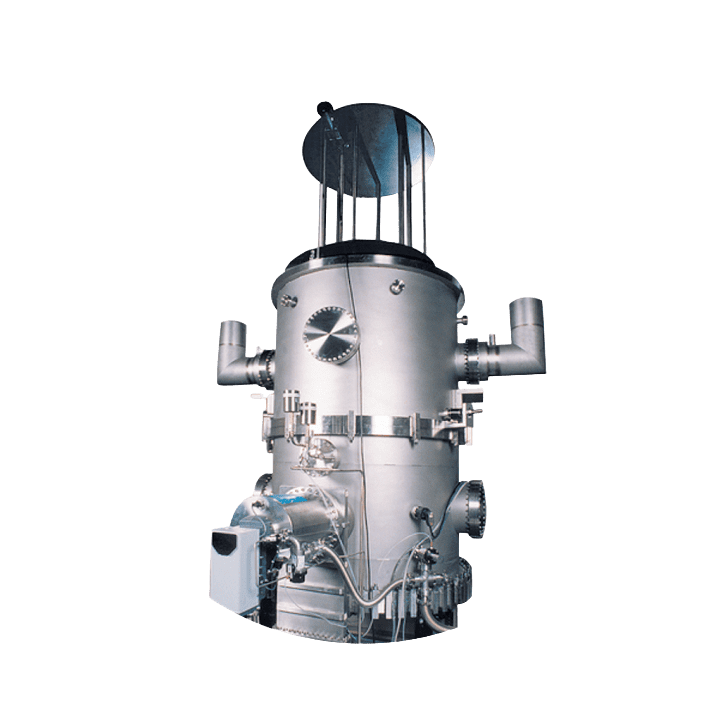 Industrial stainless steel reactor on black background.