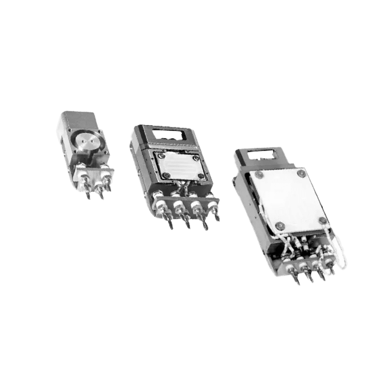 Three electronic components on a black background.