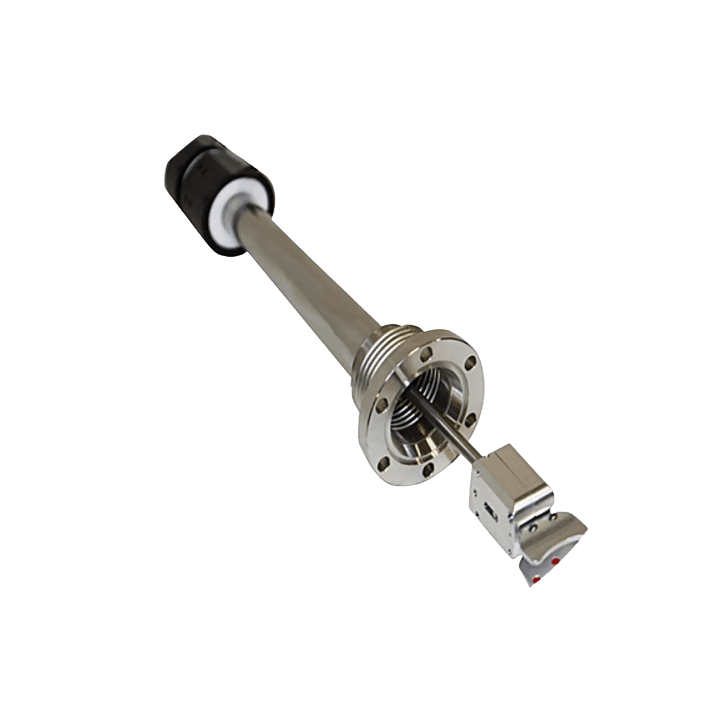 Metallic industrial sensor on black background.